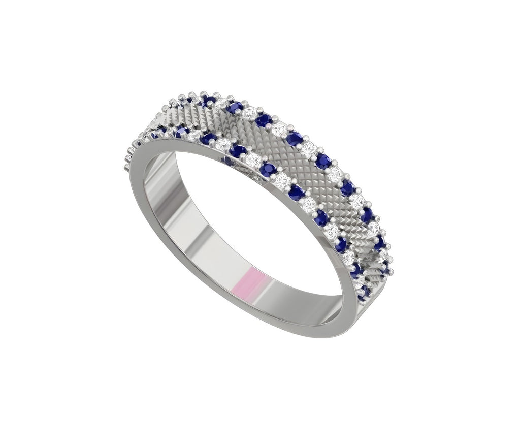 Silver ring with blue and white gemstones on a white background
