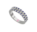 Silver ring with blue and white gemstones on a white background